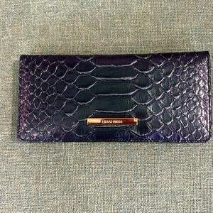 Brahmin “Ady” wallet. 7.5”w 3.5”h .5”d. Genuine leather. zip change pocket.